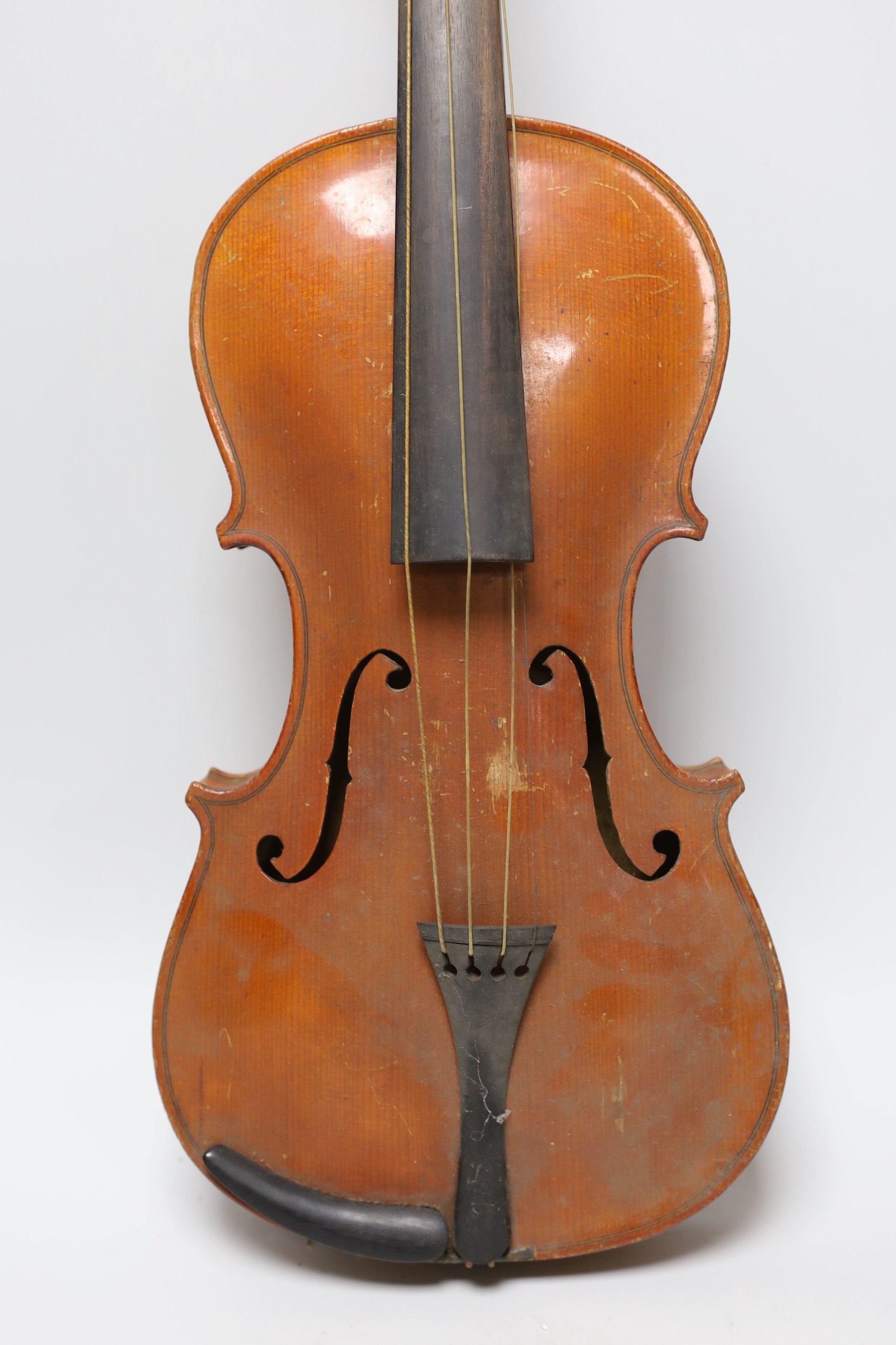 An early 20th century Stainer violin, patent number 23140, back measures 36.5cm excl button. cased